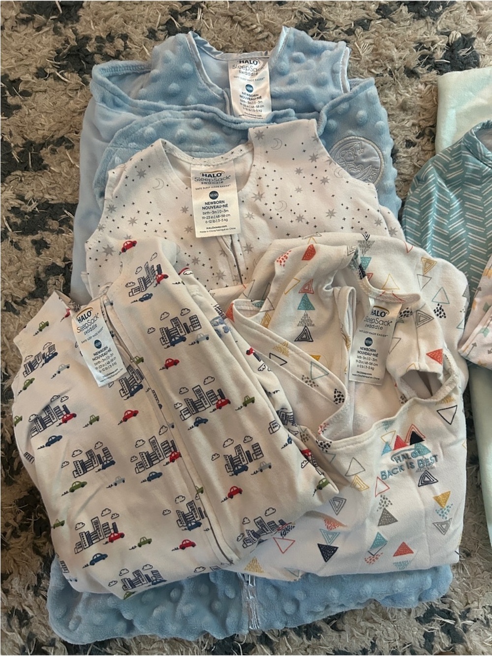 Halo Baby Sleep Sacks Set in Light Blue, White, and Multicolor Prints